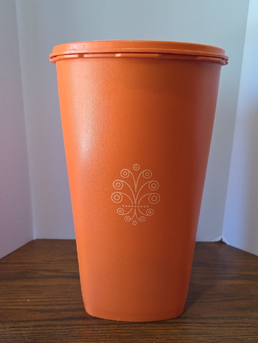 Tupperware Orange Tall Storage Canister with Decorative Emblem